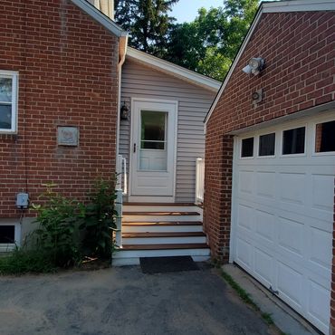 Driveway side elevation and new entrance