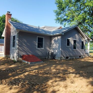 Side elevation at bulkhead leading to new basement