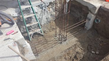 Steel rebar is set before the concrete forms are installed
