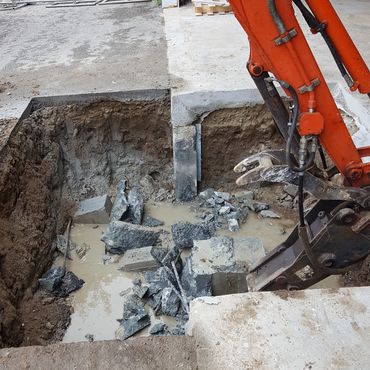 Concrete wall is moved all the way down to the existing footing
