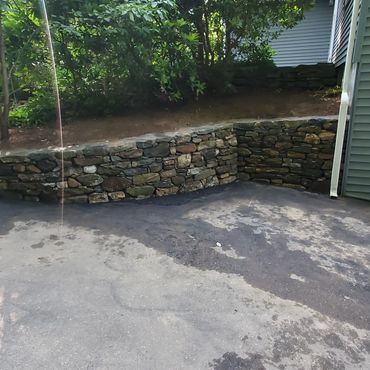 The new CT fieldstone retaining wall is complete