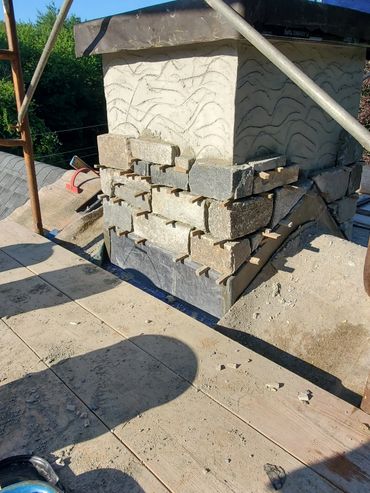 New stonework to have mortar joints to protect chimney for the elements