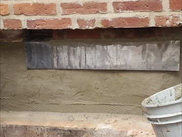 The inner brick leaf is flashed with a lead pan