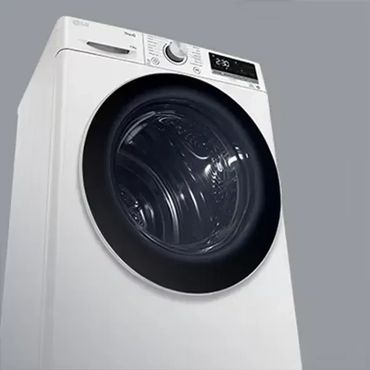 Modern front-loading washing machine with digital controls and white finish.