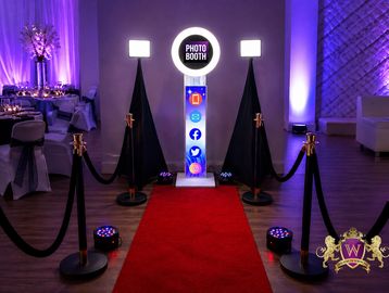 Golden rope barrier in a dimly lit event space.