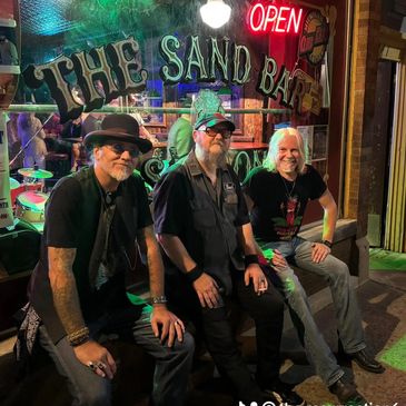 Resurrection Blues Band relaxing after a hot performance in Saugatuck Michigan at the Sand Bar Saloo