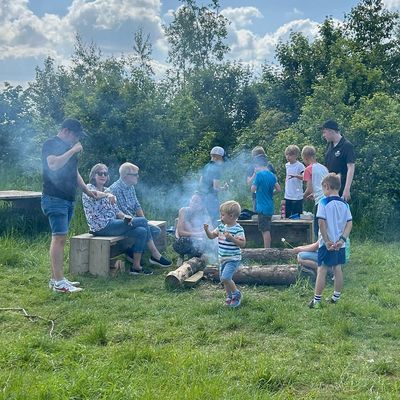 Kids around a campfire at a kids party at Fat Squirrel Outdoor