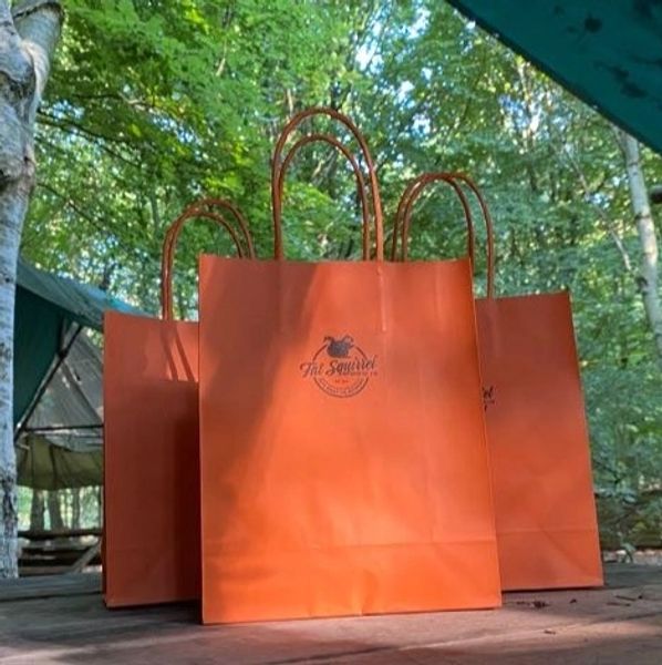 Orange party bags at Fat Squirrel Outdoor