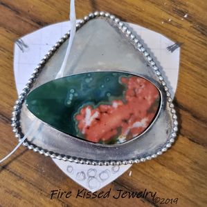 Commissioned sterling silver and ocean jasper gemstone pendant. Checking the fit of the gemstone.
