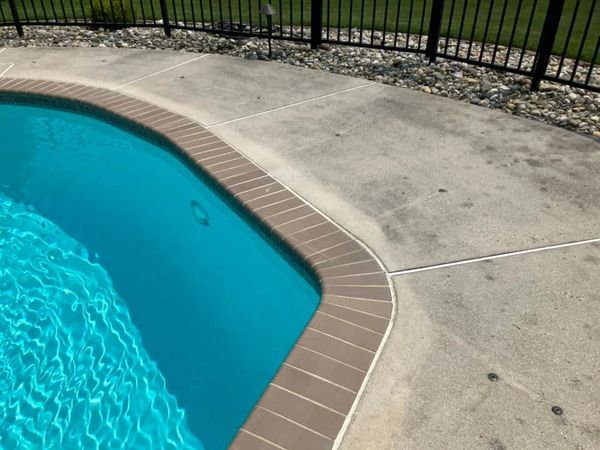 BEFORE SURFACE CLEANING OF POOL AREA