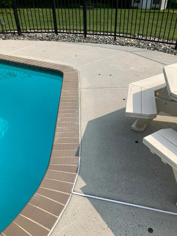 CONCRETE CLEANING OF POOL AREA