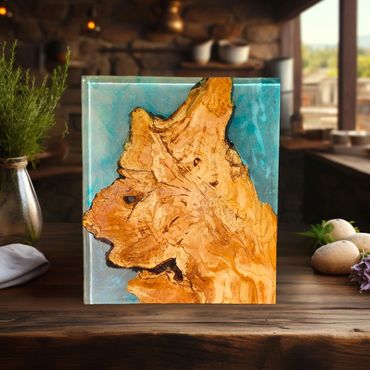 olive wood and light blue resin charcuterie serving board.