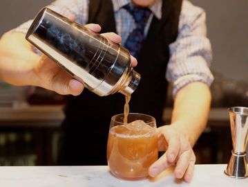 an espresso martini being poured