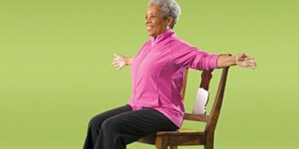 Woman exercising while seated