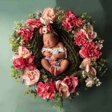 First year milestone photo in Bryan, TX by Dimples and Cheeks Photography with baby props and smiles