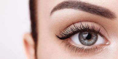 Close up image of a girl face, eyes with white skin