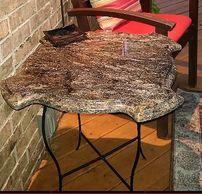 gorgeous accent table made of remnant granite