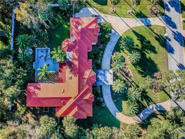 Aerial view of a red tile roof replacement in Seminole County, FL