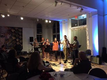 Sarah LeMieux playing acoustic music