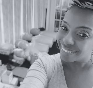 Arikka Anderson taking selfie with camera