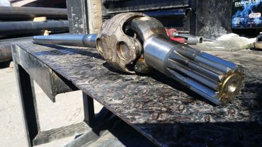 axle with u-joint on a bench