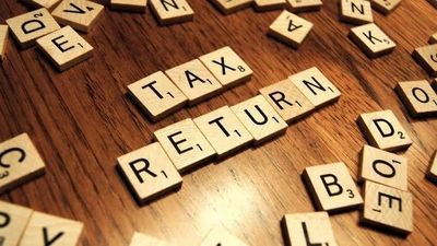 tax return tiles on desk