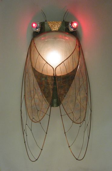 Cicada Sconce. Street l amp lens with copper body, copper screen and wire wings, inner and exterior 