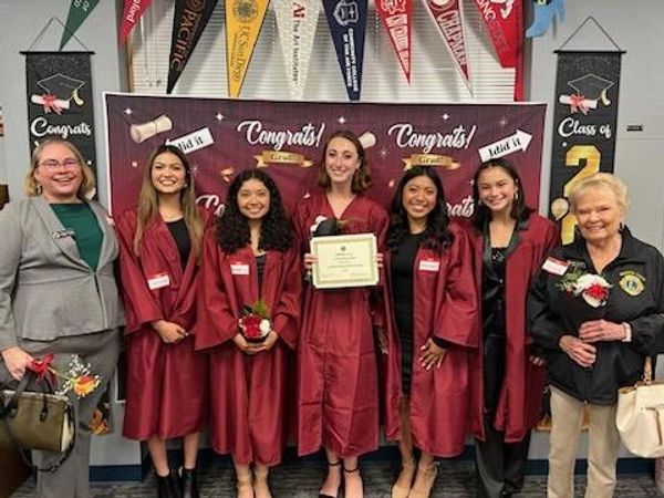 high school graduates celebrate