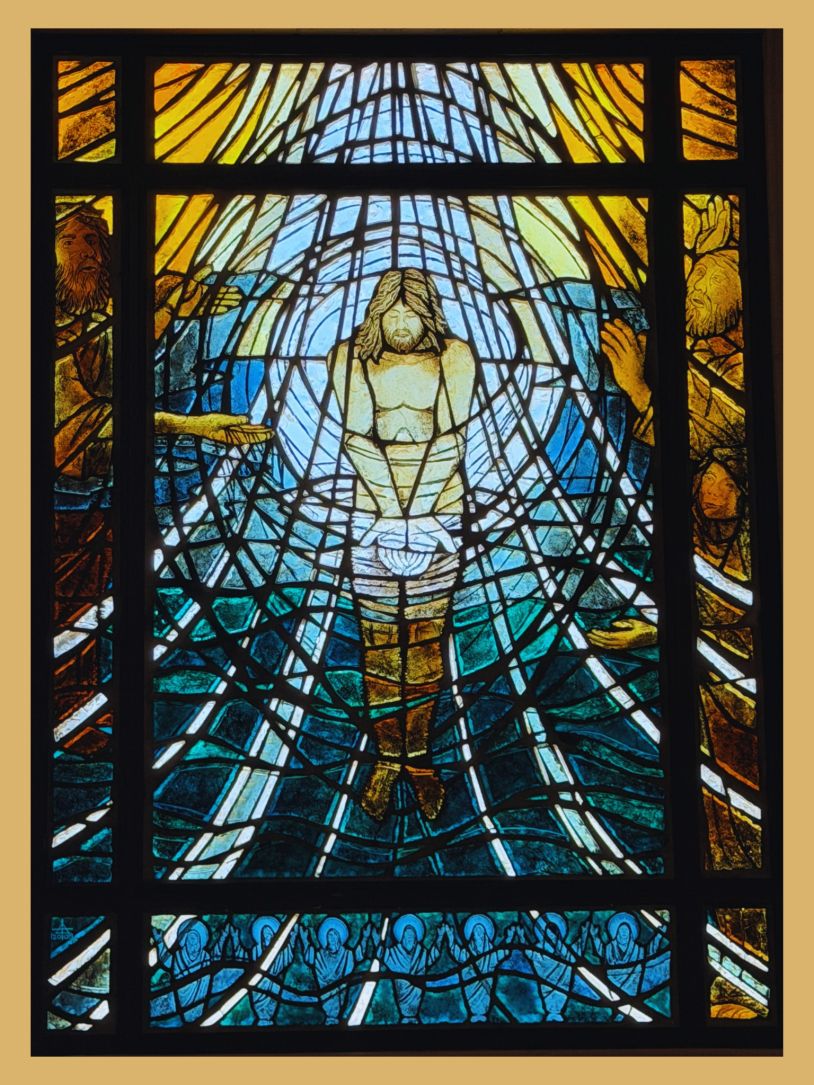 Stained glass artwork depicting a central figure surrounded by radiant light and outstretched hands.