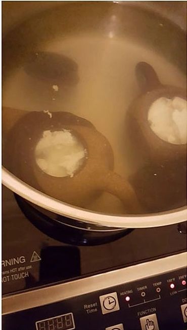 Boiling the teapots.