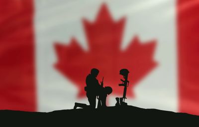 Soldier kneeling in front of Canadian Flag, whalley whalley legion whalley 229 229 legion