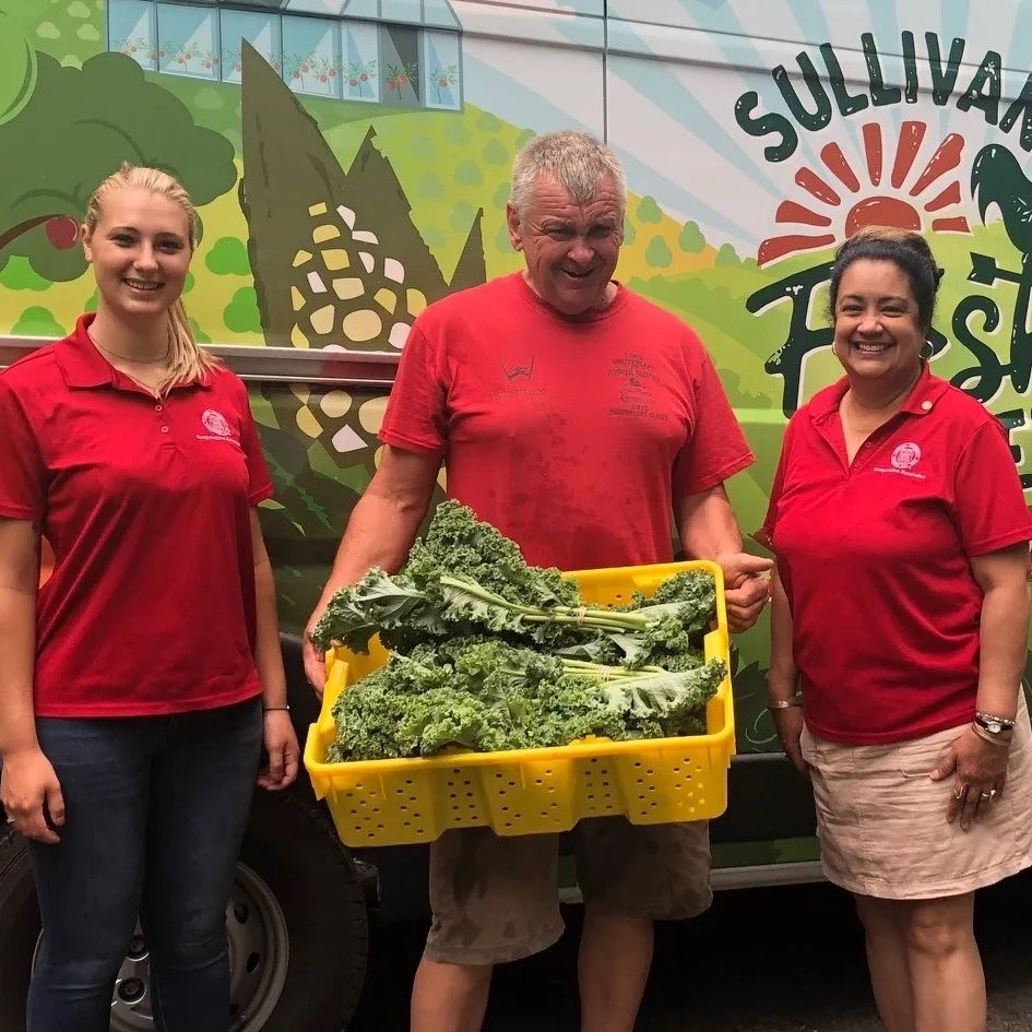 Sullivan Fresh Community Cupboard preparing greens for delivery