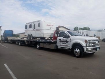 Flatbed towing truck