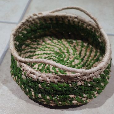 Handmade raffia basket with handles