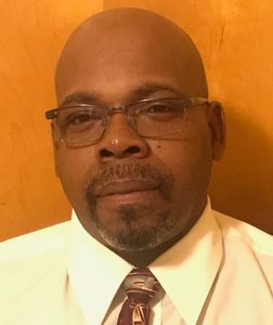 handyman in a nice shirt and tie