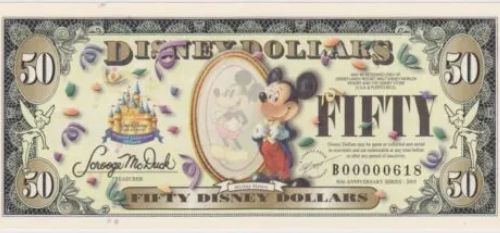 A colorful Disney-themed fifty-dollar bill featuring Mickey Mouse and Cinderella's castle.