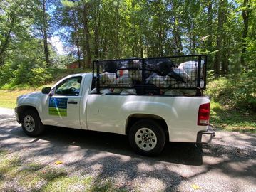 Customized 8 ft truck bed with 3ft cage added. Essentially doubles your volume.