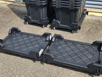 Additional moving bin dollies can hook together to make a train for transporting inside storage faci