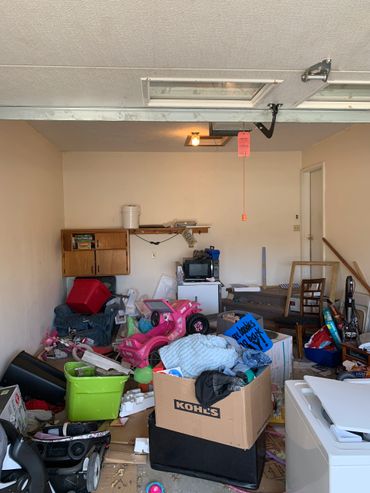 A cluttered garage filled with various household items and toys.