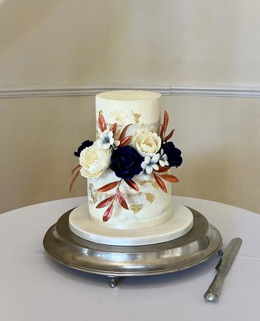 2 tier buttercream wedding cake with sugar flowers 