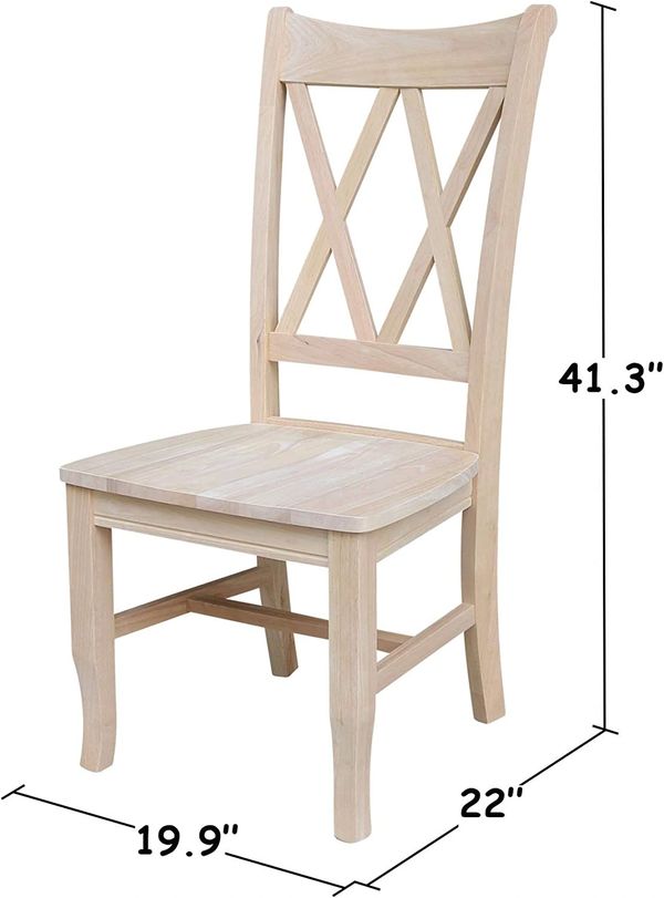 Charleston-style wooden dining chair with a decorative double X-back, solid wood seat, and gently sh