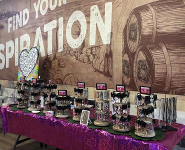 Jewelry display table at a market or craft fair.