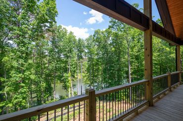 View of Lake LeCroy in the High River Community from the deck of a custom built contemporary home