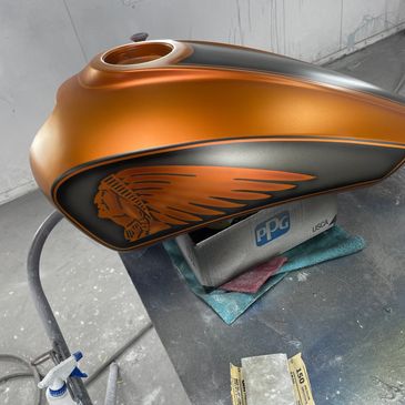 A custom painted Indian motorcycle tank 