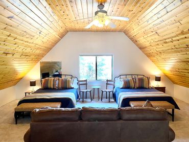 The Loft sleeps six in two queen beds and a sleeper sofa