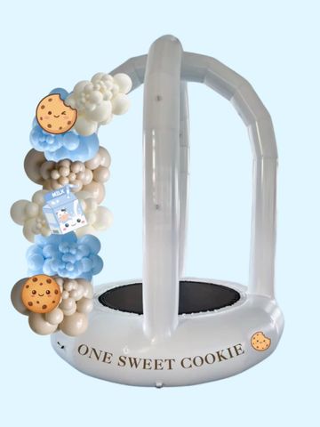 Inflatable ring with cookie and milk design.