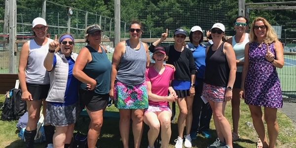 Adult tennis champions at Marcus Lewis Tennis Center
