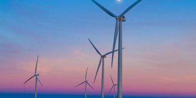 Wind turbines representing renewable energy and the transition to net zero.