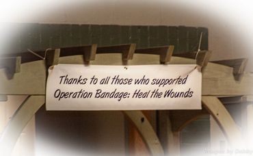 Banner thanking supporters of Operation Bandage: Heal the Wounds.