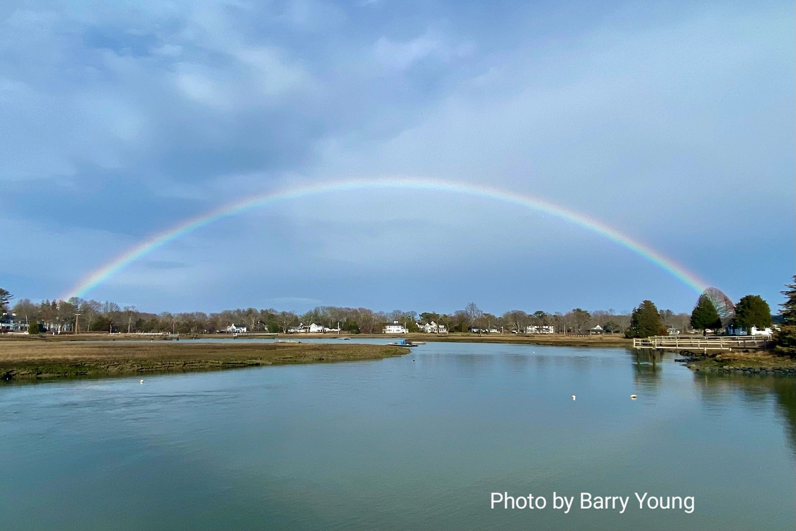 Photo of a rainbow over water in Duxbury